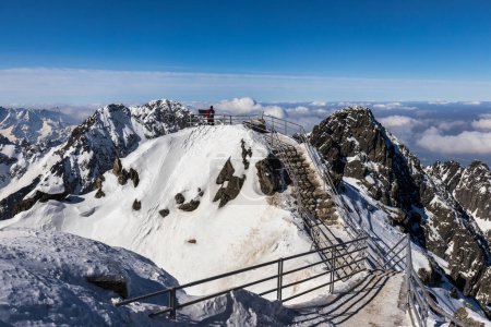 Photo for Snowy winter high mountain landscape. Lookout at the top of The Lomnicky peak in High Tatras National Park, Slovakia, Europe. - Royalty Free Image