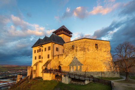 Photo for The Trencin Castle above the town of Trencin at sunset, Slovakia, Europe. - Royalty Free Image