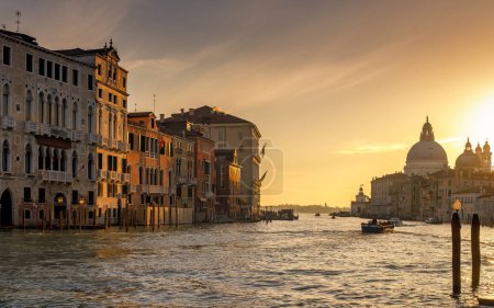 Photo for The Grand Canal in Venice with the Santa Maria della Salute basilica at a beautiful sunrise, Italy, Europe. - Royalty Free Image