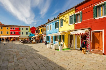 Photo for BURANO, ITALY - MARCH 3, 2023: Street with a colorful houses, island near Venice. - Royalty Free Image