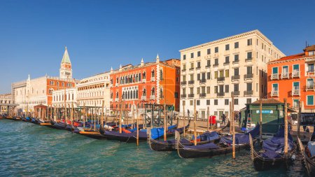 Photo for VENICE, ITALY - MARCH 4, 2023: The embankment with palaces and gondolas at sunny morning. - Royalty Free Image