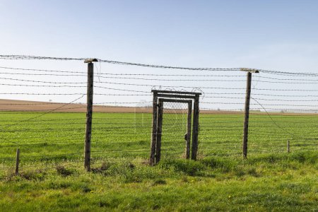 Barbed wire fence. Historical Area of the Czechoslovak fortification Satov for defense against Nazi Germany near Znojmo town in the South Moravian Region of the Czech Republic, Europe.