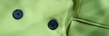 Photo for Closeup of custom made green jacket with black buttons. Strict business jacket and details - Royalty Free Image