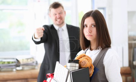 Angry yelling boss point arm to exit dismissing sad worker with stuff box portrait. Bad news pack and carry belongings hopeless human resources staff reduction hr get upset give sack concept