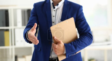 Photo for Close-up of businessman willing to shake hand, confirm deal, support decision, finish discussion. Friendly gesture towards client. Deal, agree concept - Royalty Free Image