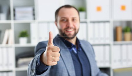 Photo for Young handsome promising businessman work in office lend hand ahead show big finger up all right concept - Royalty Free Image