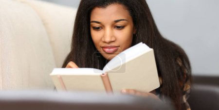 Photo for Smiling black woman write story in notebook preparing for college - Royalty Free Image