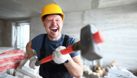 Photo for Angry builder holding sledgehammer and shouting at customer on floor apartment under repair. Quick dismantle concept noise walls. - Royalty Free Image