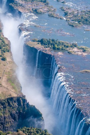 Telephoto shot of the immense Victoria falls, as seen from the air.