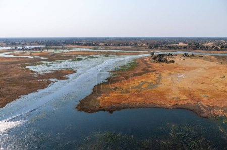 Photo for An aerial impression of the Okavango Delta, Botswana, as seen from a Helicopter. - Royalty Free Image
