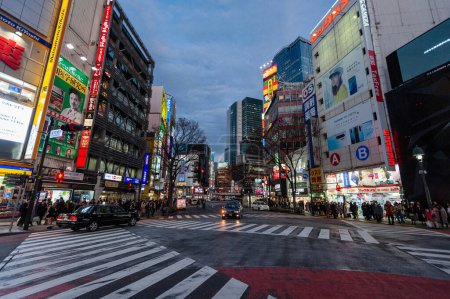 Photo for Tokyo, Japan - January 9, 2020. Exterior of the busy streets of Tokyo, near the famous Shibuya Crossing. - Royalty Free Image