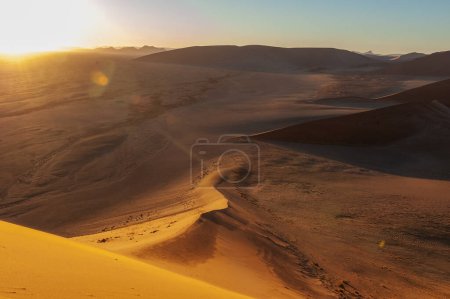 Photo for Exterior shot of the Namibian Sossusvlei sanddunes near the famous Dune 45 around sunrise - Royalty Free Image
