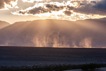 Photo for Sunset near the flat sand dunes in Death Valley National Park, California. - Royalty Free Image