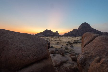 Photo for Sunset near Spitzkoppe, a famous granite peak in the center of namibia. - Royalty Free Image