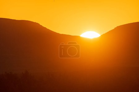 Photo for Sunset over the Orange river, on the border between Namibia and South Africa. - Royalty Free Image