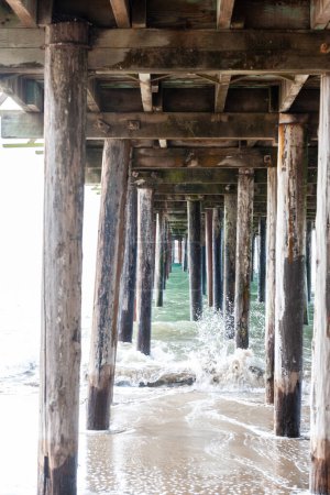 Exterior shot of the wooden support structure that carries the Sea Cliff Pier near Aptos, California.