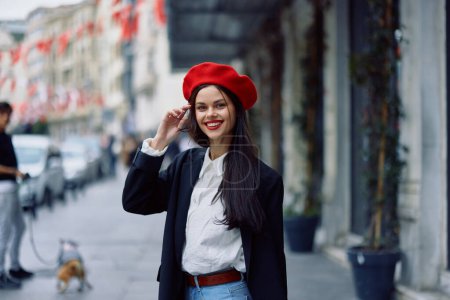 Photo for Happiness woman walks walks in the city against the backdrop of office buildings, stylish fashionable vintage clothes and make-up, spring walk, travel. High quality photo - Royalty Free Image