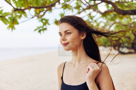 Photo for Woman person smiling beach ocean caucasian sand sky vacation adult summer shore nature walk sea holiday running young girl smile travel - Royalty Free Image