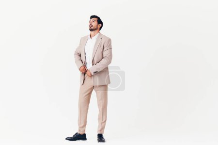 Photo for Businessman man confident model happy victory smiling beige shirt work up adult job running business success suit tie portrait professional winner - Royalty Free Image
