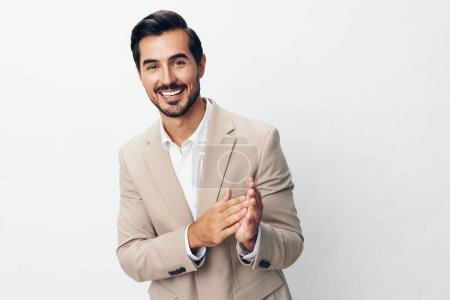 Photo for White man suit isolated beard victory fashion beige hand smiling young businessman confident success work happy business job winner posing arm - Royalty Free Image