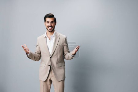 Photo for Man beige crossed model guy handsome portrait smiling male businessman attractive copyspace studio suit white happy business job folded background beard - Royalty Free Image