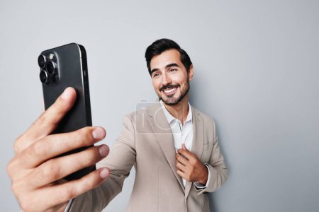 Photo for Business man white smartphone happy cell technology phone corporate smile call guy hold suit holding app portrait communication internet lifestyle handsome - Royalty Free Image