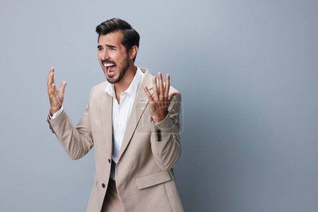 Photo for Man executive entrepreneur studio shout crazy anger screaming emotion businessman up angry work suit begs hands boss business pleads gesture background hand - Royalty Free Image