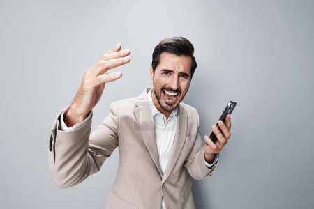 Photo for Connection man beige smile lifestyle happy portrait selfies phone call guy holding message hold internet suit confident app smartphone business businessman - Royalty Free Image