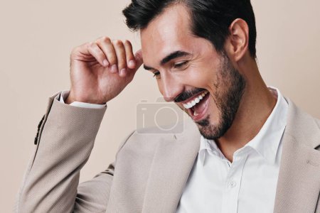Photo for Young man beige handsome copyspace smiling portrait fashion job folded corporate business formal suit happy isolated businessman professional sexy confident crossed - Royalty Free Image