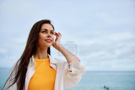Photo for Portrait of a happy woman smile with teeth with long hair brunette summer travel and feeling of freedom, balance. High quality photo - Royalty Free Image
