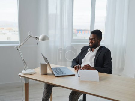 Photo for Education man business programmer work african male home conference office job american computer laptop desk online freelance person entrepreneur freelancer student table - Royalty Free Image