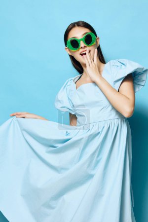 Photo for Day woman woman dance blue dress lady isolated lifestyle fashionable studio fashion beautiful girl glamour summer feminine clothes model style young pastel - Royalty Free Image