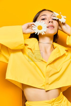 Photo for Woman day positive chamomile smile day beautiful happiness natural nature attractive pretty romantic stylish yellow model valentines woman beauty portrait young girl flower - Royalty Free Image