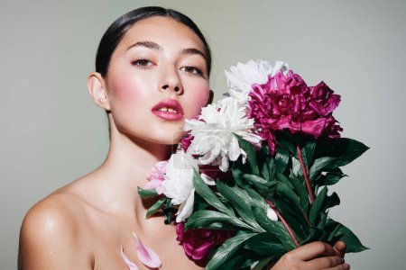 Photo for Woman face blush care fashion style make-up flower portrait art woman spa girl fresh floral model beauty lip day person pink lifestyle - Royalty Free Image