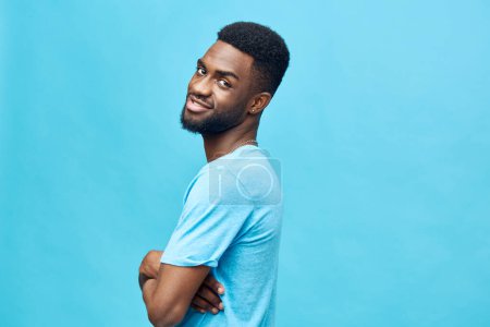 Photo for Black man fashion african look lifestyle african background expression attractive guy smiling person white happy stylish portrait smile face posing handsome american blue - Royalty Free Image
