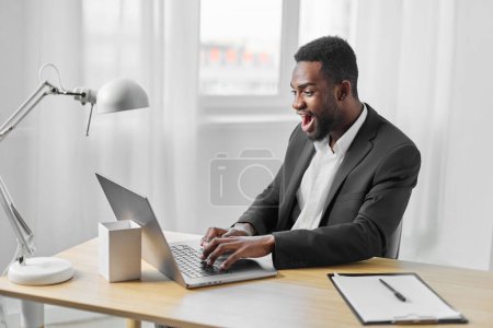 Photo for Man chat laptop office education modern manager african employee call student freelancer web american businessman smiling online computer job workplace programmer sitting - Royalty Free Image