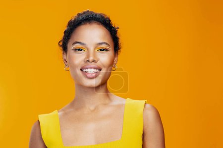 Photo for Copy woman fashion face beauty black make-up african smile cosmetic portrait studio skin cosmetology creative space beautiful pink yellow colourful eye ethnic style model - Royalty Free Image