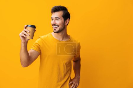 Photo for Man hipster drink pink mug fashion cup sleep space coffee energy paper hot smile student happy copy tea studio t-shirt - Royalty Free Image