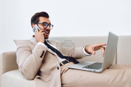 Photo for Desk man occupation call attractive video computer office success business winner laptop talk phone happy connection businessman successful glasses smile modern portrait worker - Royalty Free Image