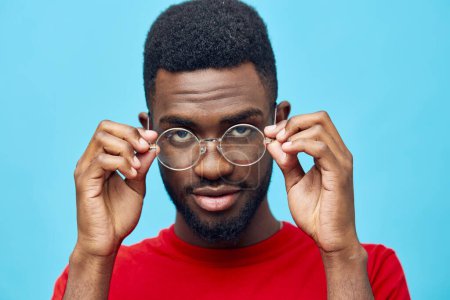 Photo for Blue man clothing glasses male model style black american african green beauty american face african fashion red stylish adult portrait fashionable trendy - Royalty Free Image