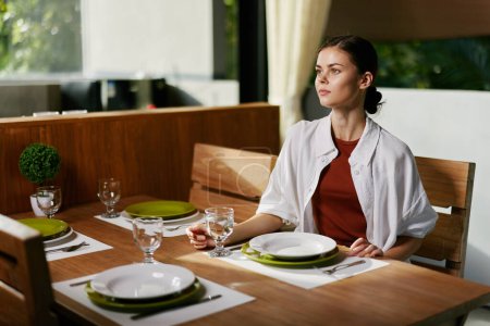 Photo for Table elegant women casual female drink beauty one restaurant caucasian pretty attractive lifestyle cafe business lady sitting young portrait food person adult - Royalty Free Image