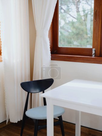 Photo for Empty dining table with chairs in light interior by window, cozy design. High quality photo - Royalty Free Image