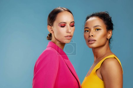 Photo for Woman beautiful shine american beauty face model portrait bodycare skin two together girl race colorful attractive happy yellow make-up mixed studio healthy african - Royalty Free Image