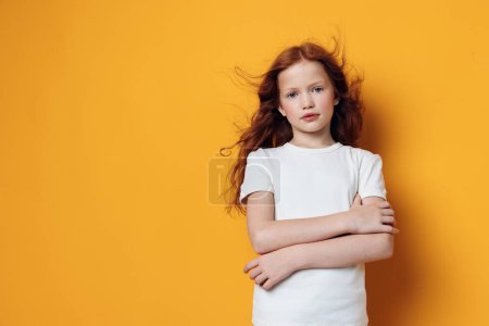Photo for Studio young background upset sad unhappy portrait beautiful person female adorable white girl children little kid caucasian pretty childhood emotion face look cute expressive - Royalty Free Image