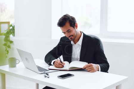 Photo for Man thinking sitting angry tired professional office job occupation executive business working workplace glasses suit white male frustration table desk laptop - Royalty Free Image