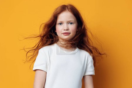 Photo for Cute angry portrait childhood emotion upset children kid beauty white girl isolated unhappy studio expression little face female sad background person caucasian young - Royalty Free Image