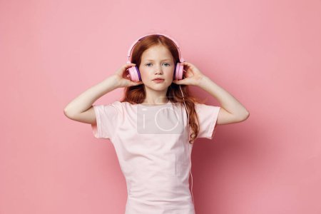 Photo for Background children little headset small music earphones sound entertainment audio technology kid childhood cute female headphones girl person enjoy song lifestyle young stereo listen - Royalty Free Image