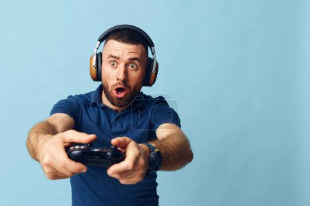 Photo for Joystick man entertainment playing game fun player lifestyle expression young happy adult console excitement man video gamer control joy holding leisure guy technology - Royalty Free Image