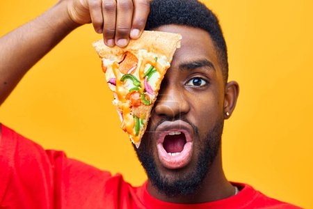 Photo for Millennial man black habit online guy food background enjoy overeating bearded eat hungry eater masculine unhealthy weight delivery happy pizza food smile fast - Royalty Free Image