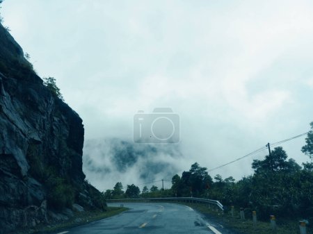 Photo for Majestic Mist: A Serene Journey through Misty Mountains and Enchanting Green Landscapes - Royalty Free Image